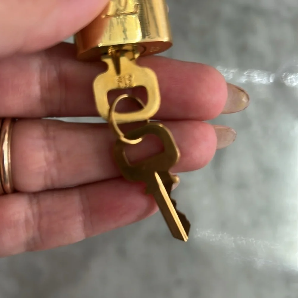 Louis Vuitton Gold Padlock and Key Set